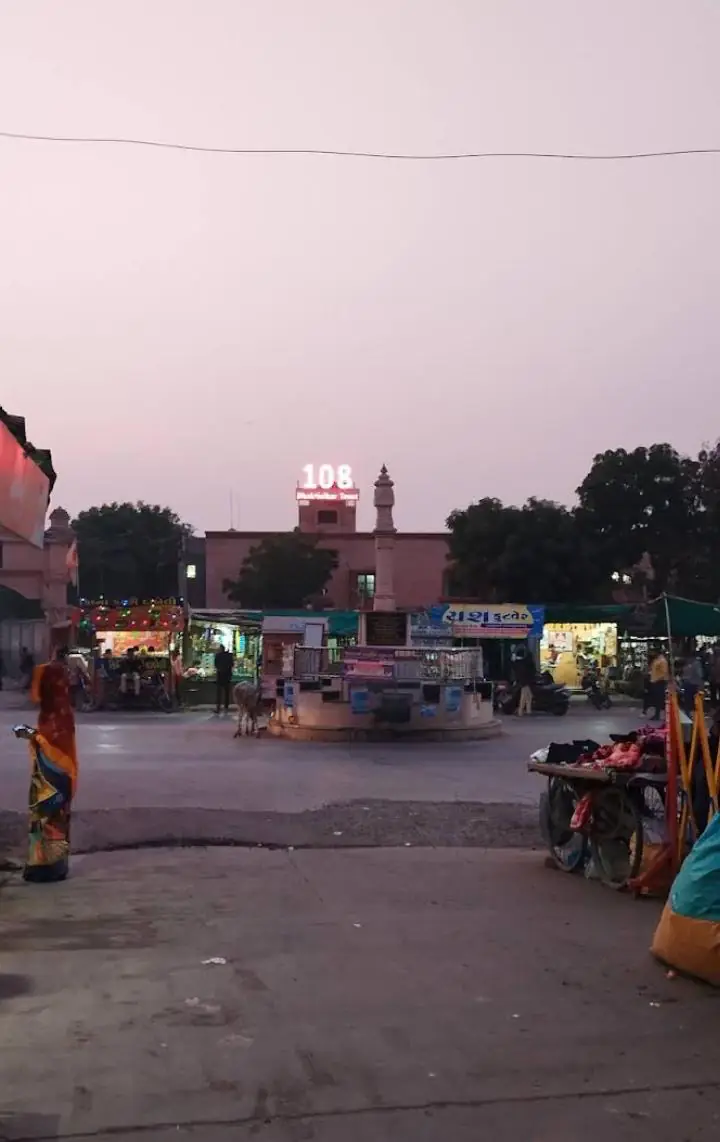 Shankheshwar town square at dusk with local shops
